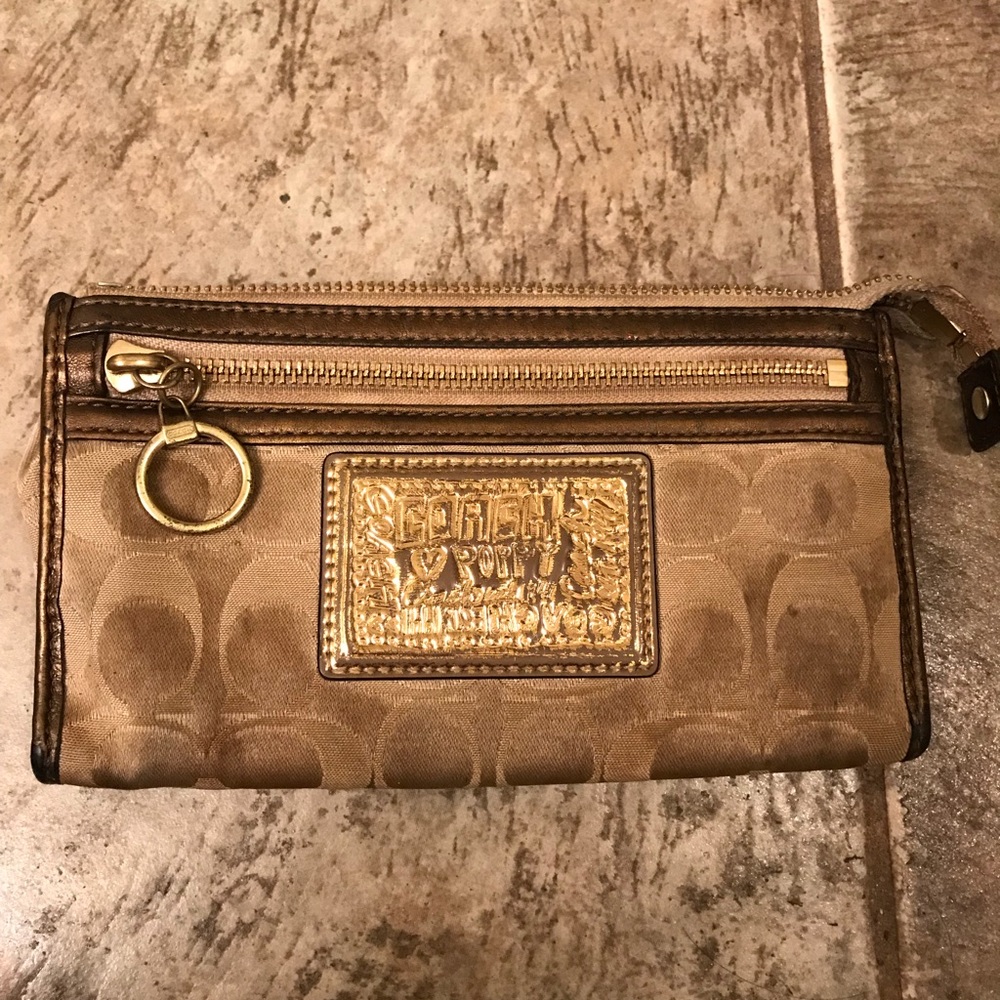 Gold COACH wristlet